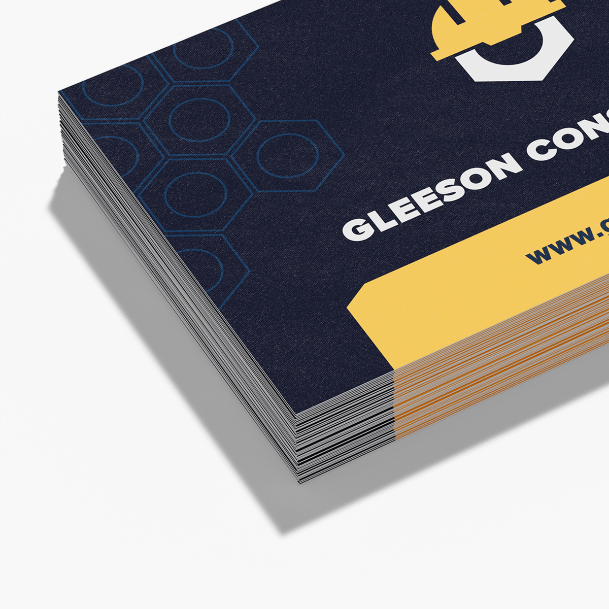 Stack of fine grit business cards with construction sample artwork