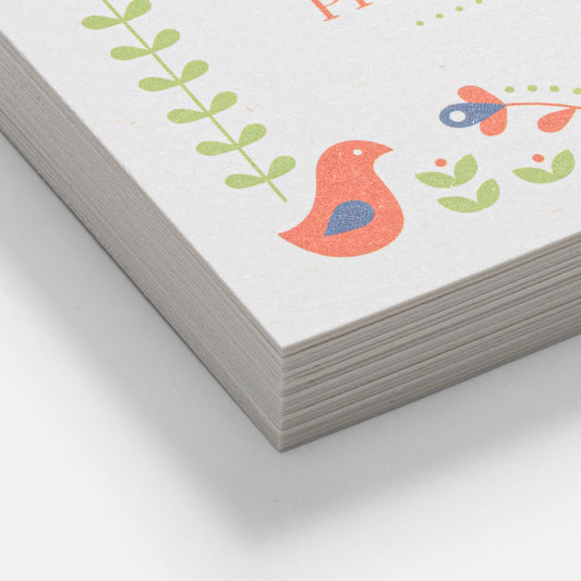 Close view of lightly speckled hemp-blend paper business cards