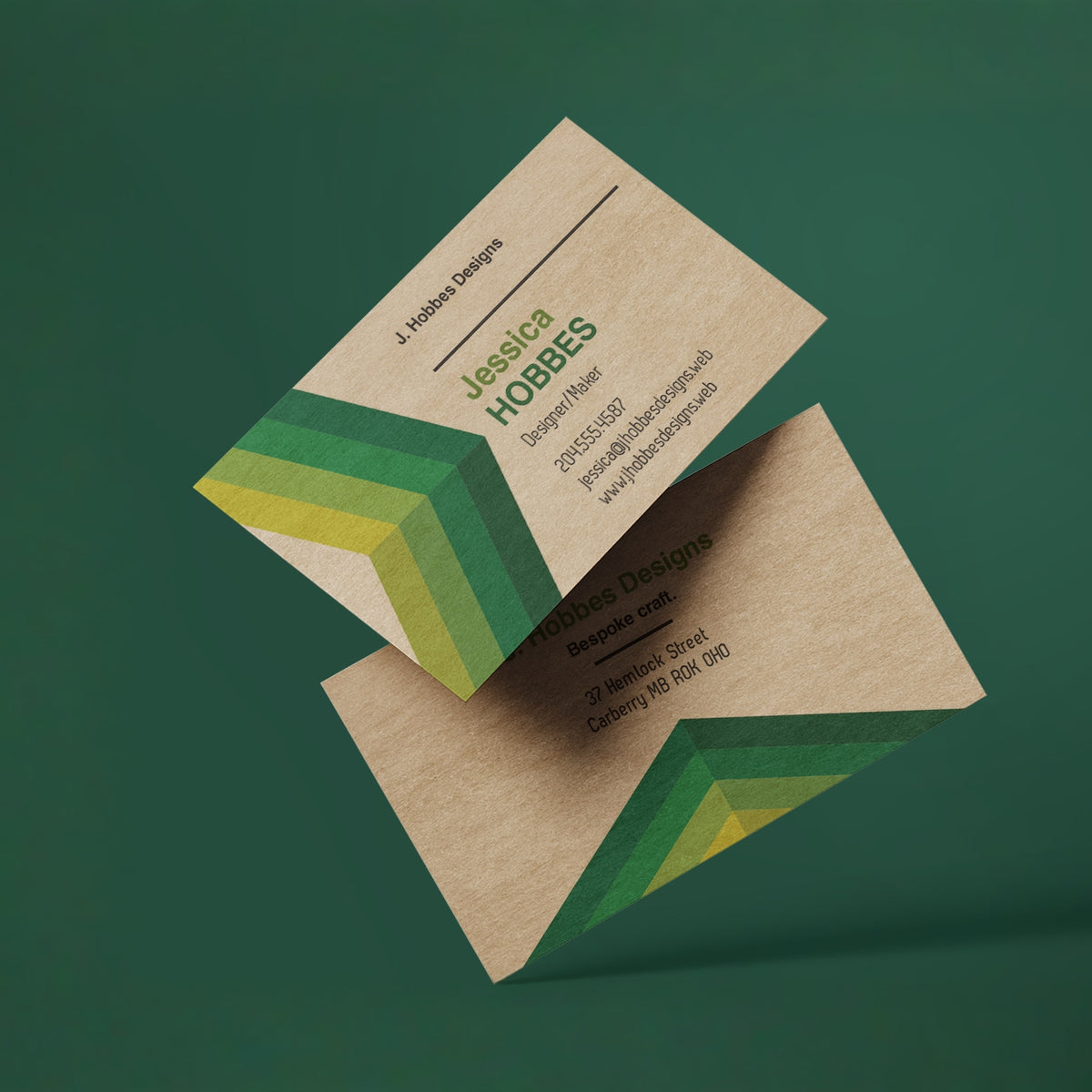 Example kraft business cards showing printed designs on natural brown stock.