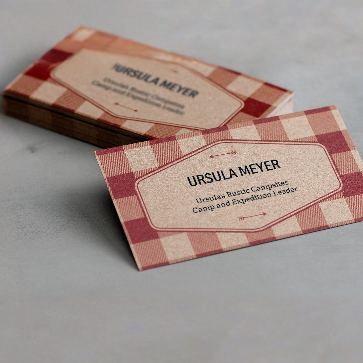 Example kraft business cards with a plaid design.