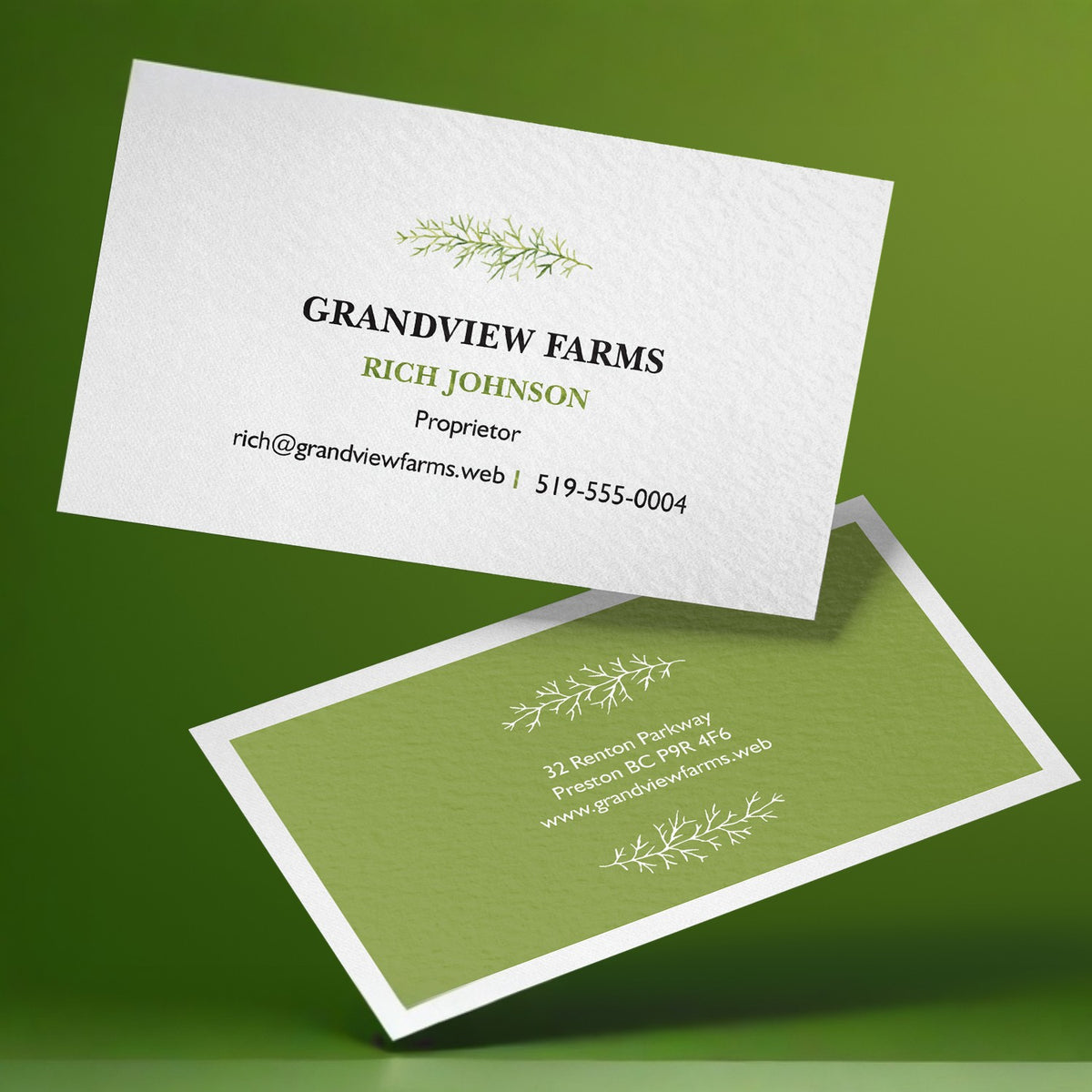 Example natural textured business cards with printed front and back designs.