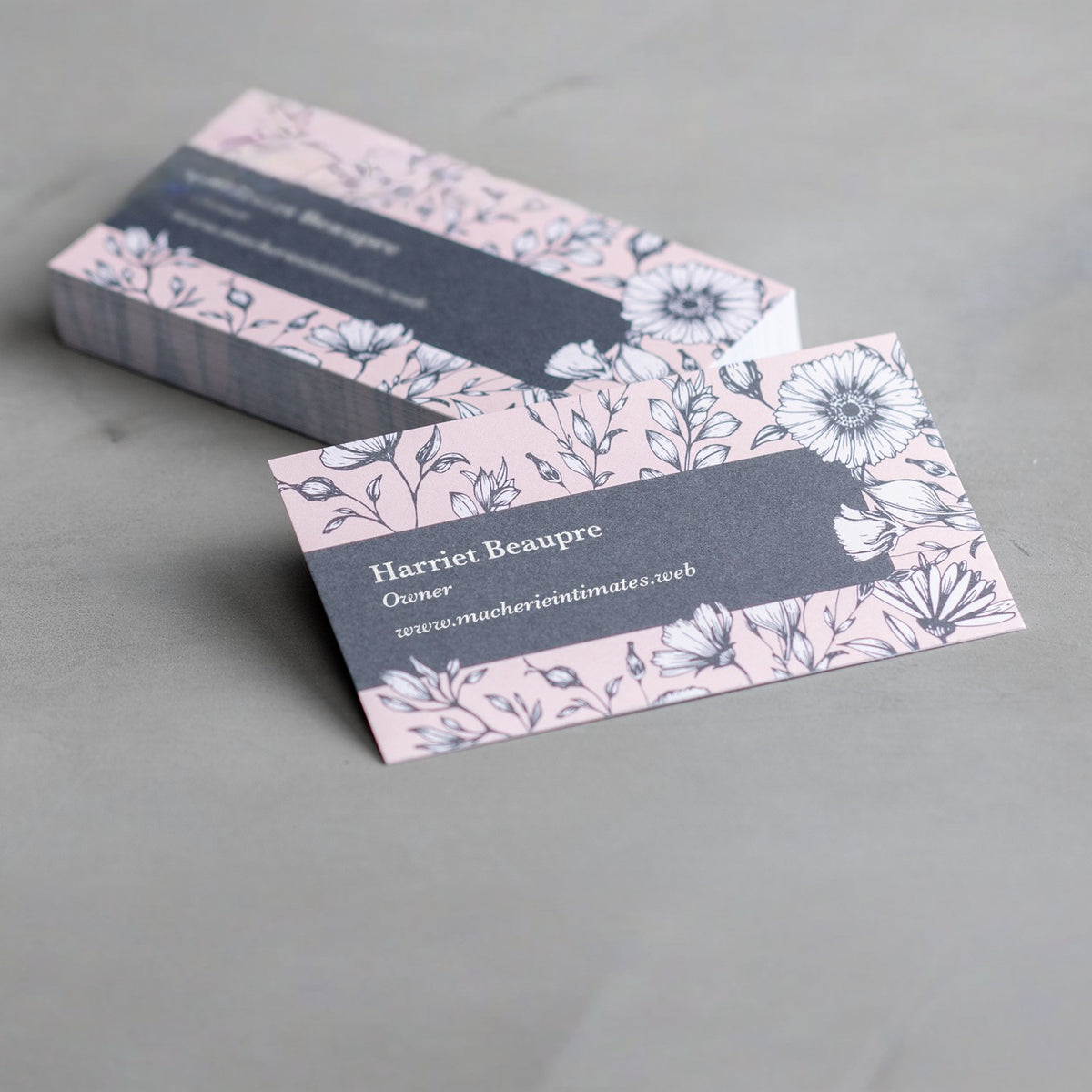 Recycled matte business cards with floral sample artwork