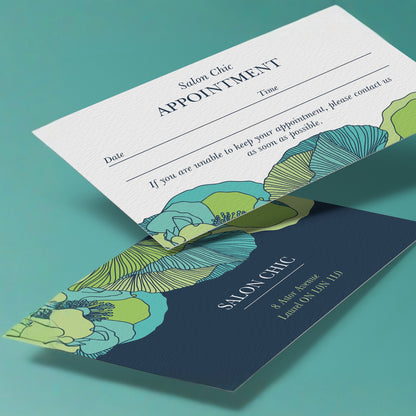 Example uncoated business cards showing a custom front and writable appointment-card reverse.