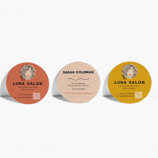Circular business cards showing front and back sample designs