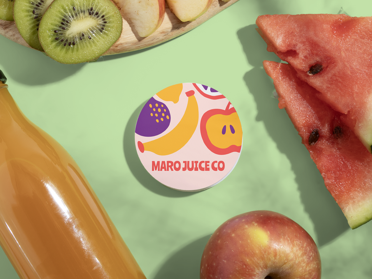 Circular business card with juice-company sample artwork