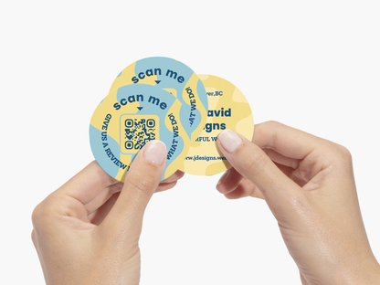 Circular business cards with a printed QR code
