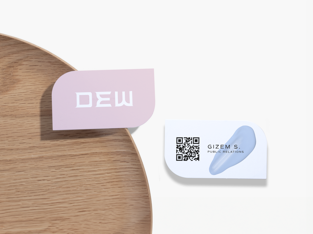 Leaf-shaped business cards with brand and QR-code sample artwork