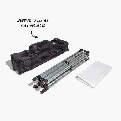 Packed canopy tent kit with frame, printed canopy fabric and wheeled case