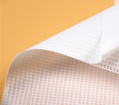 Detail of open-weave polyester mesh banner material