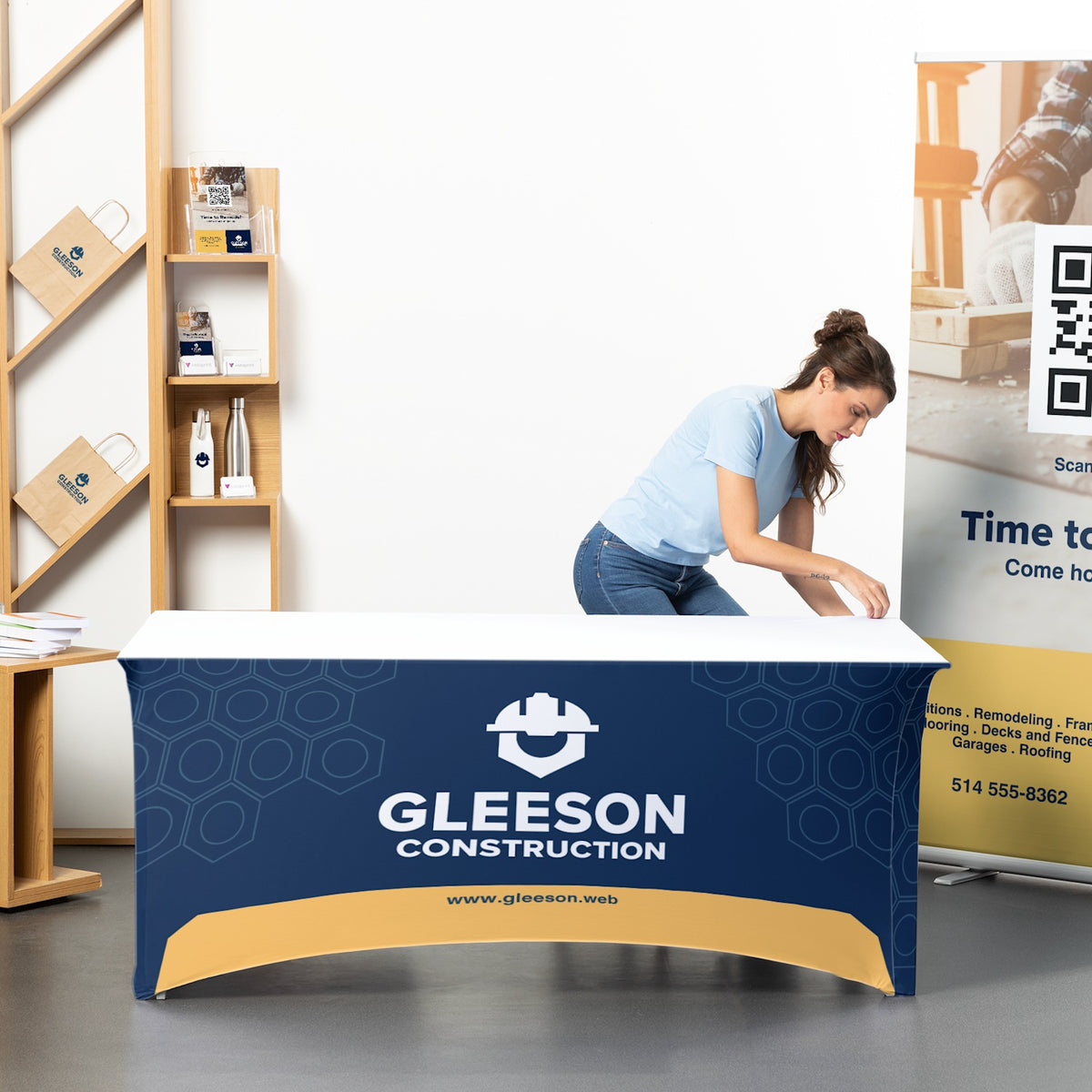 Printed stretch table cover displayed at a business booth