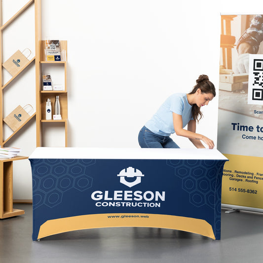 Printed stretch table cover displayed at a business booth