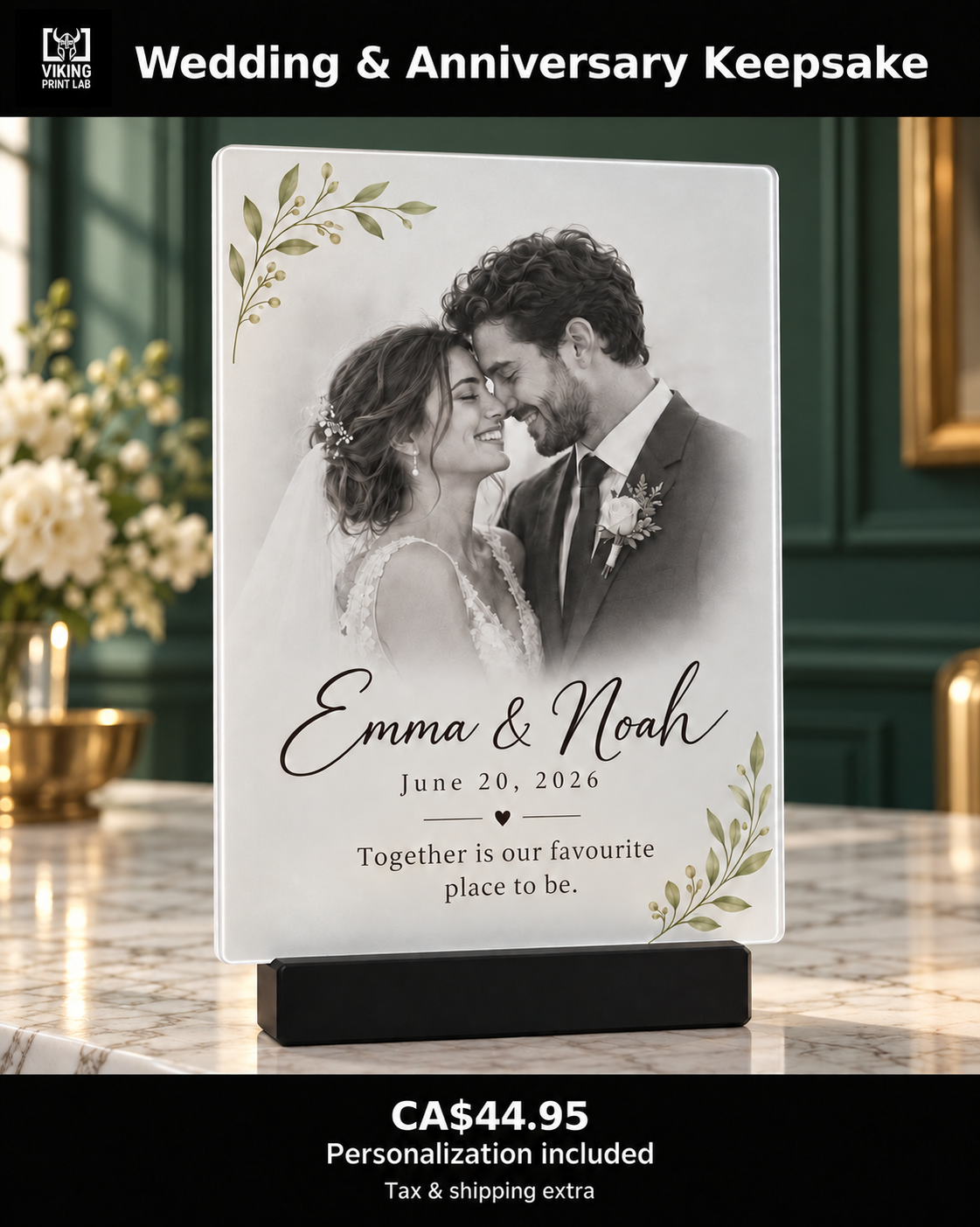 Personalized wedding and anniversary frosted acrylic keepsake with names and a date on a black stand in an emerald interior.